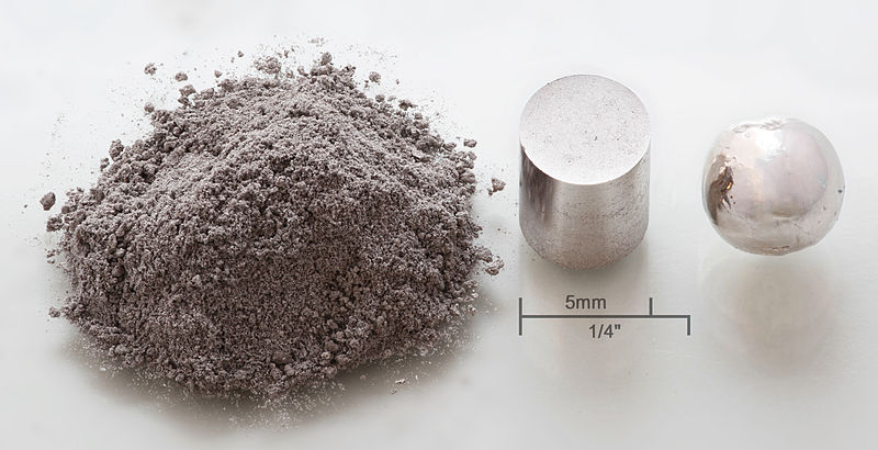 Rodium i form av pulver, pressad och smält